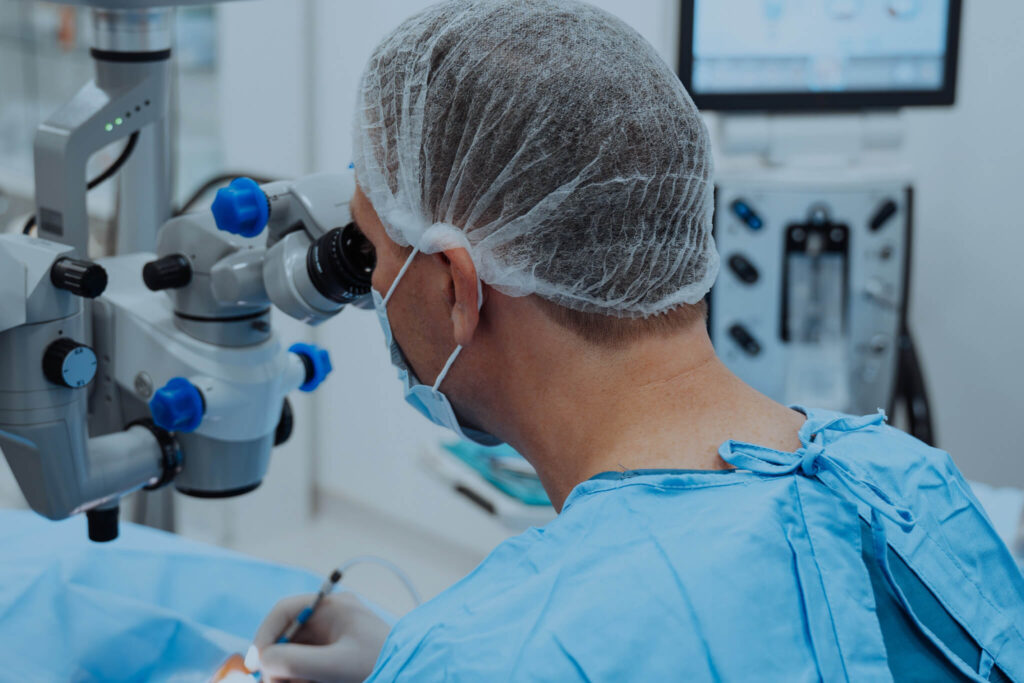 Skilled surgeon performing precise surgery on a patient.