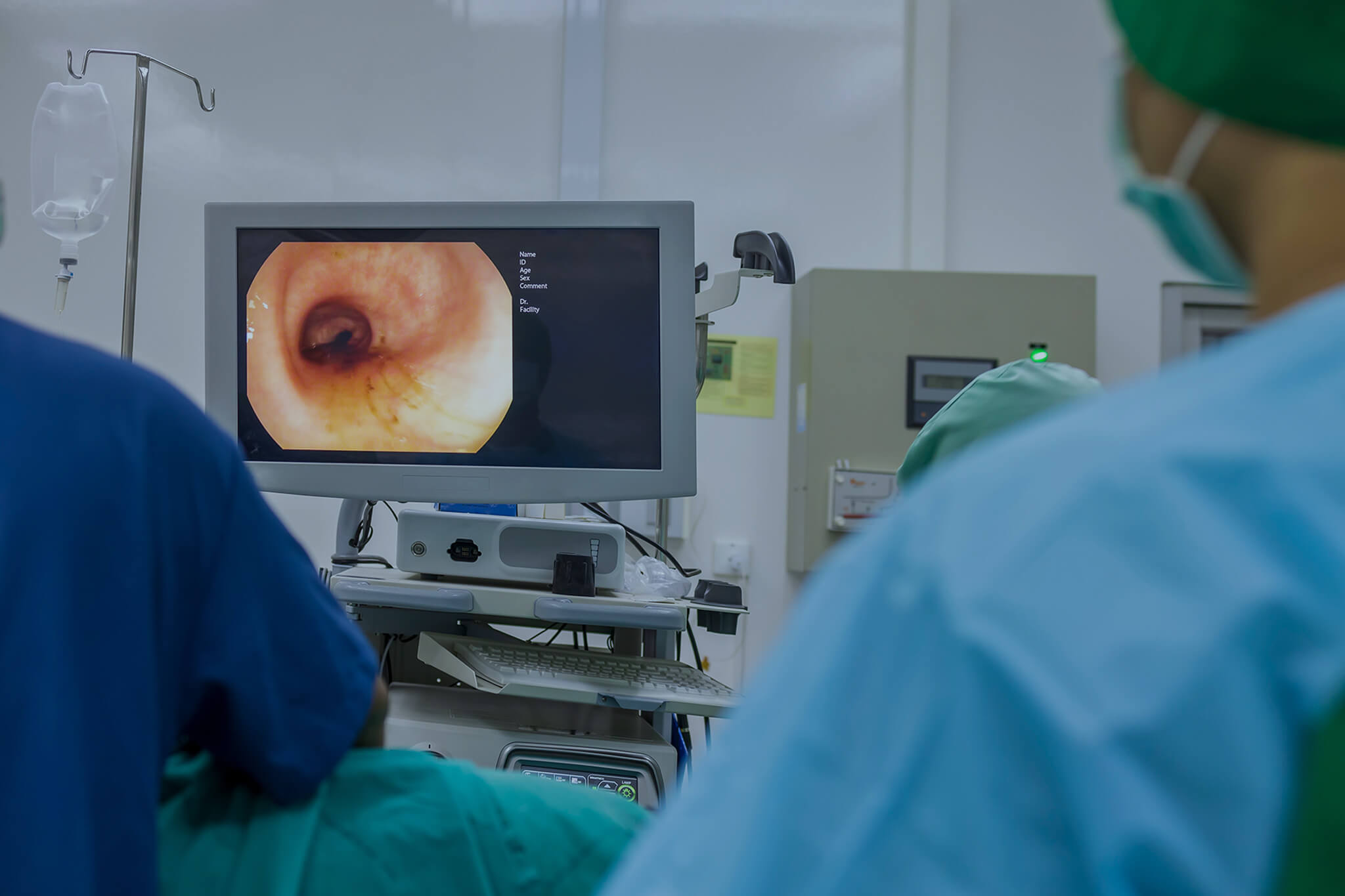 A doctor performing an endoscopy in the operation room.